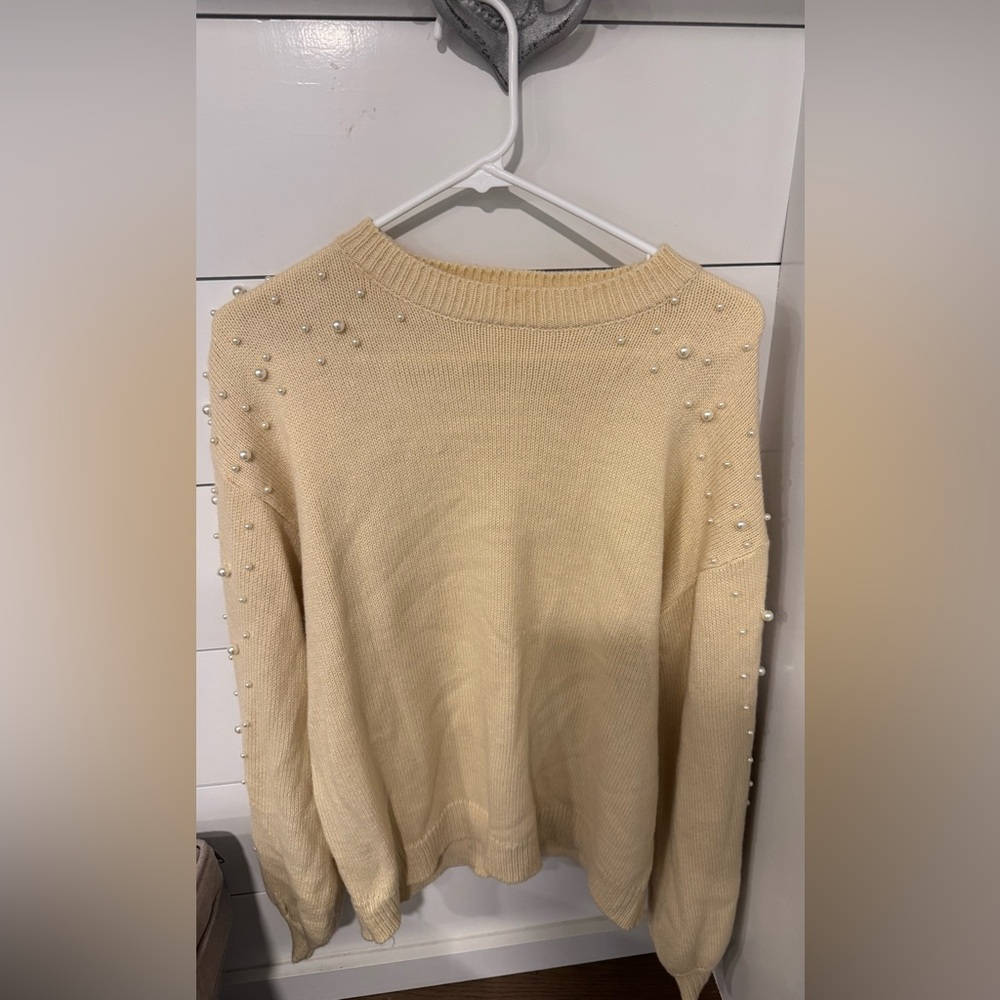 Elegant Cream Sweater with Pearl Detailing